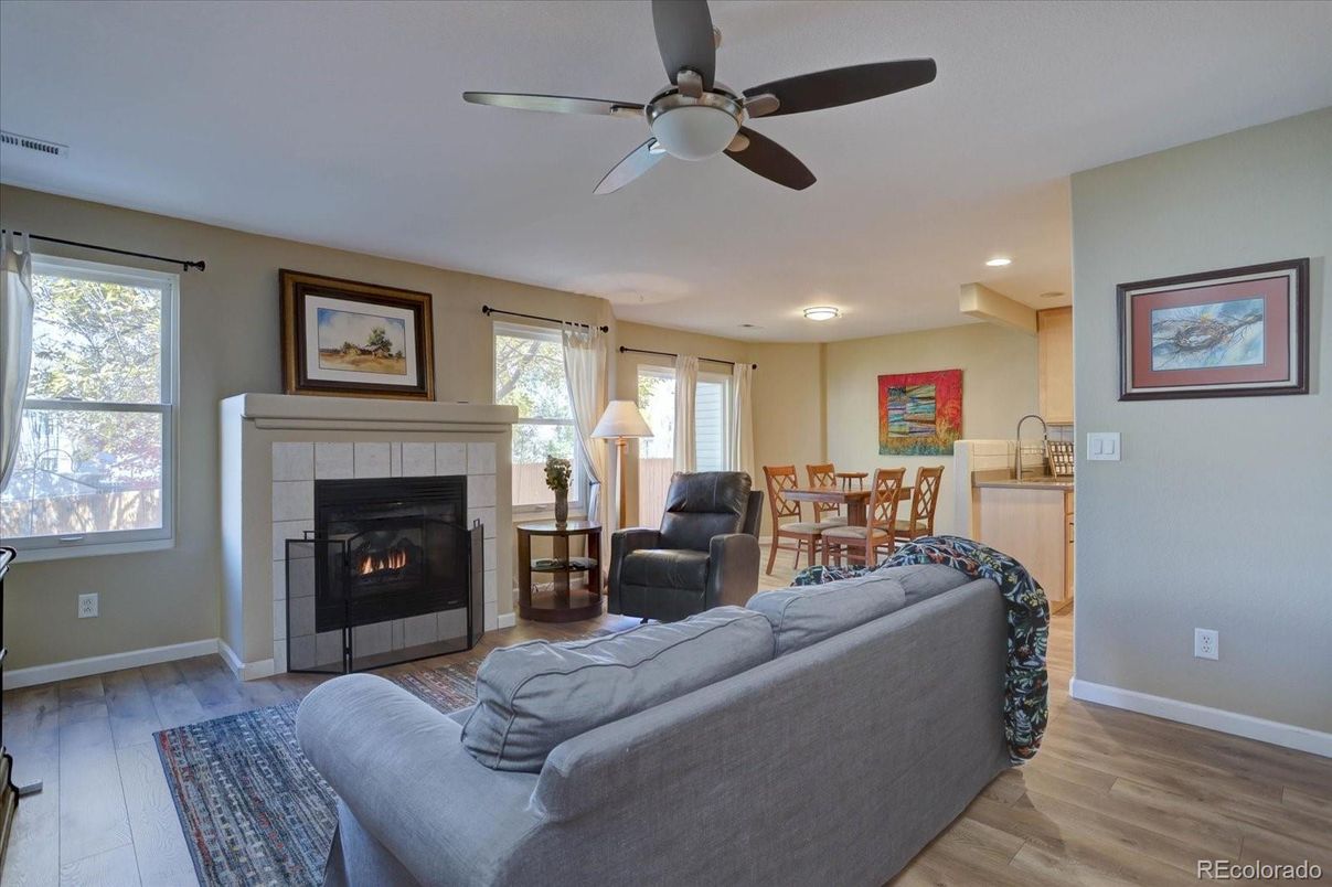 Dining room, Fireplace, Interior, Living room, Recessed Lighting, Wood Texture Flooring
