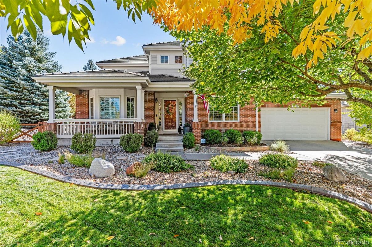 Attached, Exterior, Facade, Brick Facade, American Foursquare