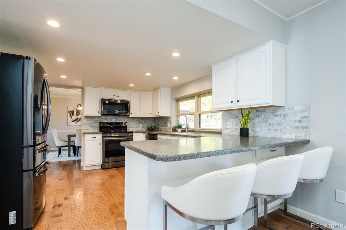 Dining room, Interior, Kitchen, Recessed Lighting, Stainless Steel Appliances, Wood Texture Flooring