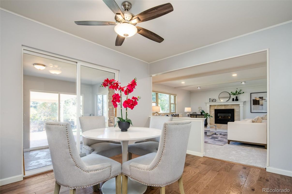Dining room, Fireplace, Interior, Living room, Recessed Lighting, Wood Texture Flooring