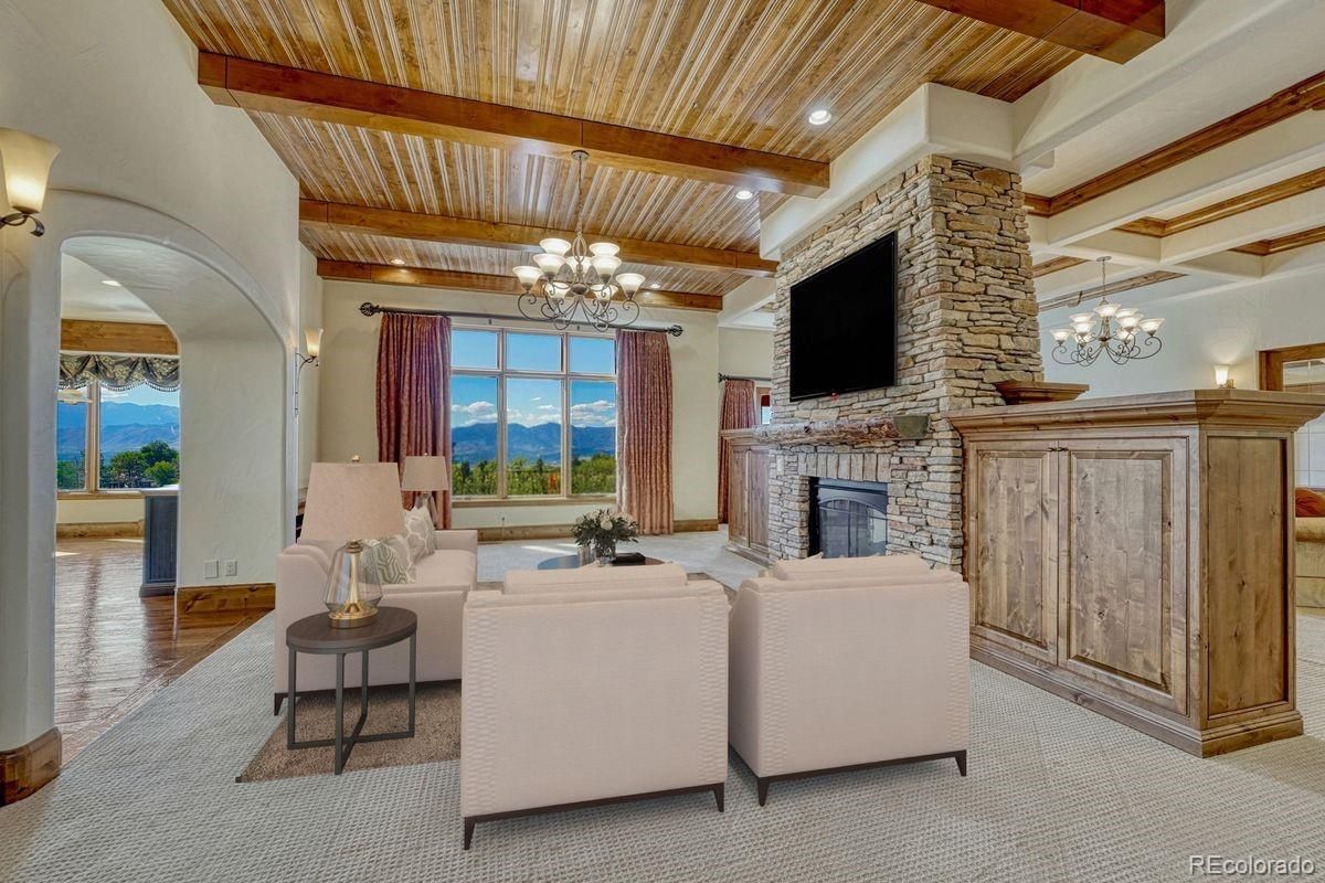 Chandelier, Fireplace, Interior, Living room, Recessed Lighting, Stone Walls, Wooden Beams, Wooden Ceilings