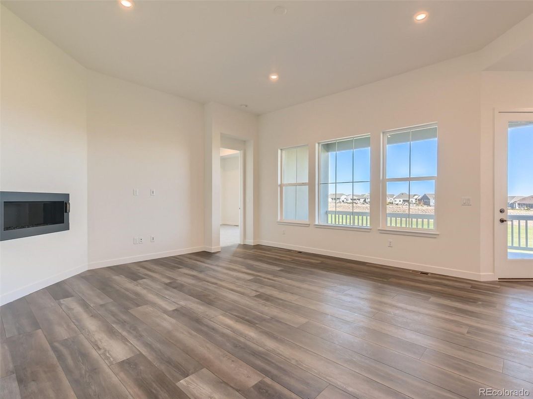 Empty room, Fireplace, Interior, Recessed Lighting, Wood Texture Flooring
