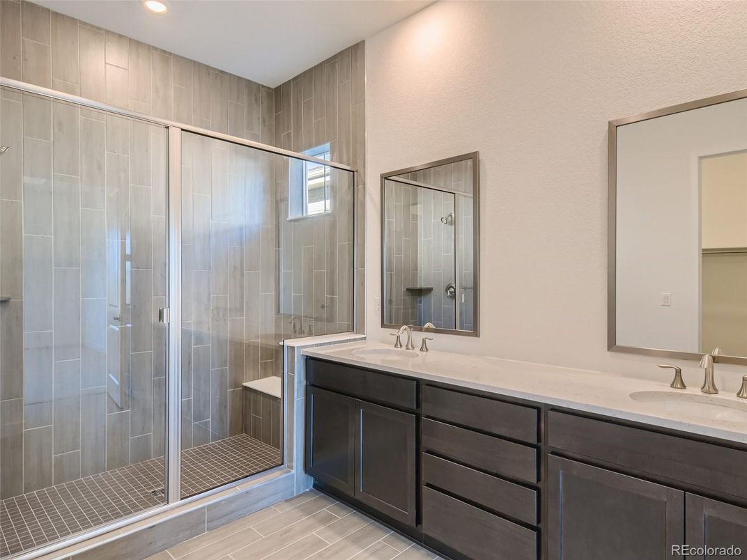 Bathroom, Dual Sink Vanities, Glass Shower, Interior, Recessed Lighting, Wood Texture Flooring