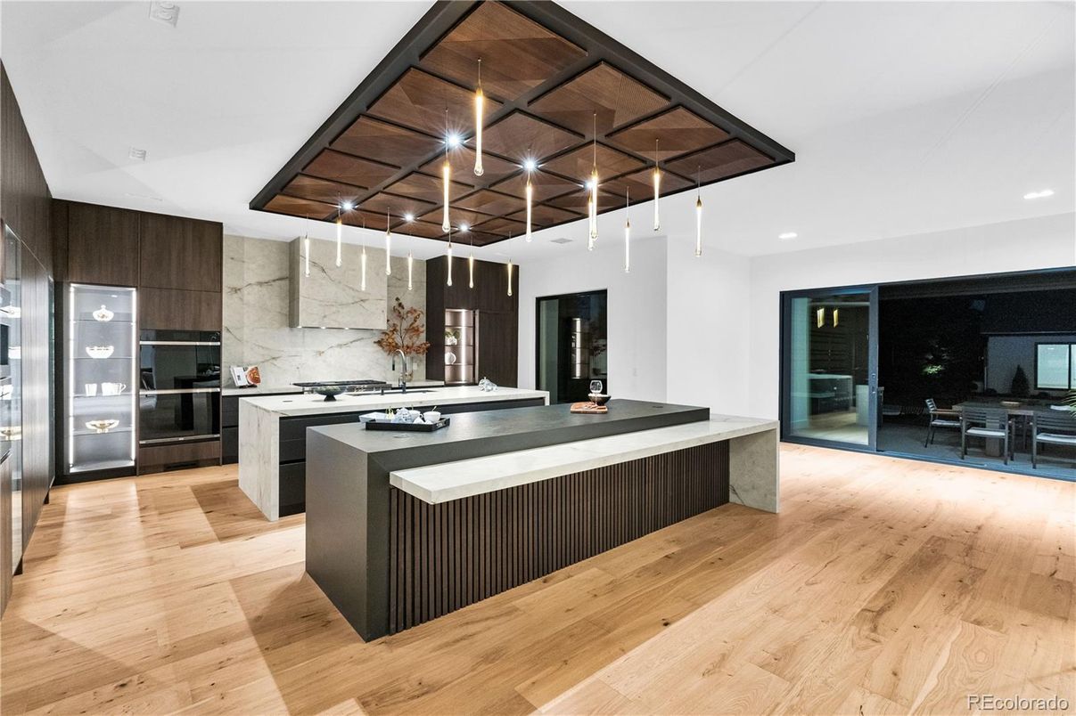 Interior, Kitchen, Marble Walls, Pendant Lights, Recessed Lighting, Stainless Steel Appliances, Wood Texture Flooring