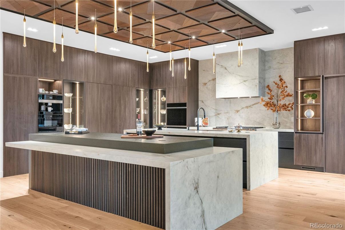 Interior, Kitchen, Marble Walls, Pendant Lights, Recessed Lighting, Stainless Steel Appliances, Wood Texture Flooring
