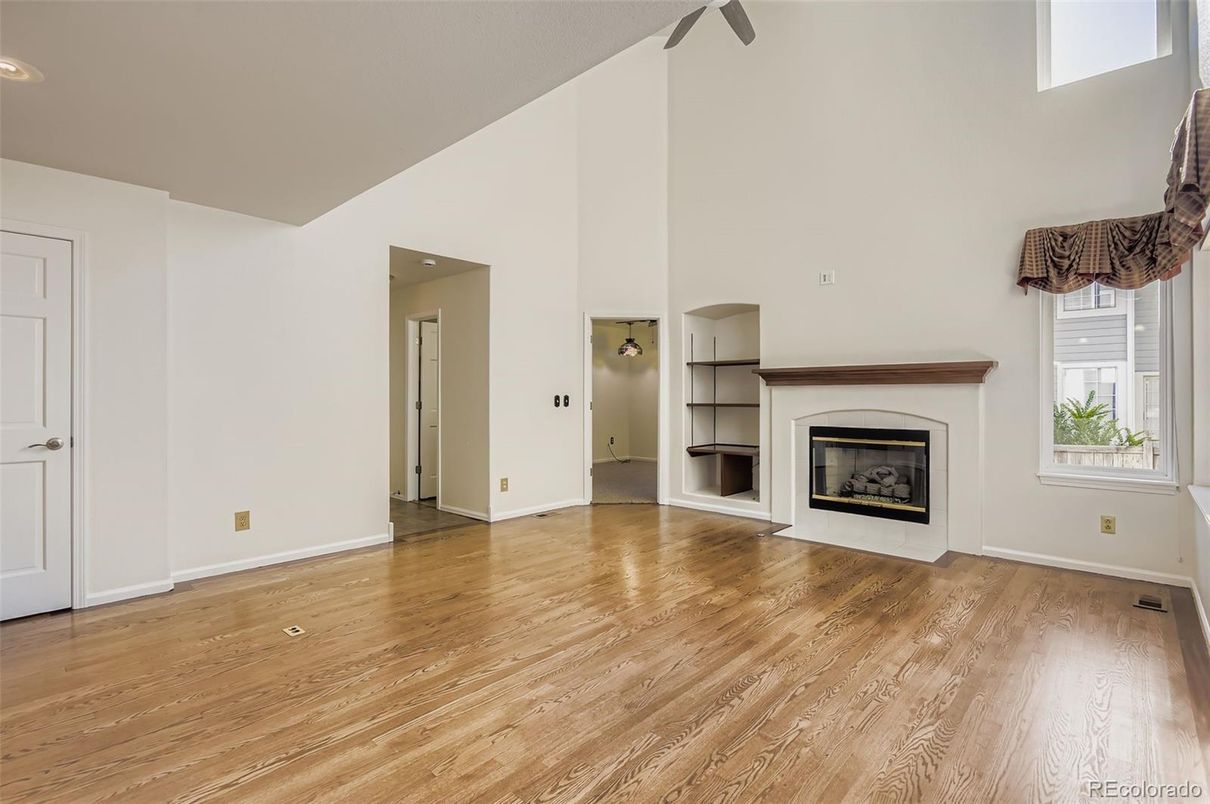Empty room, Fireplace, Interior, Recessed Lighting, Wood Texture Flooring