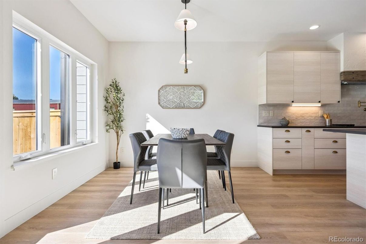 Dining room, Interior, Kitchen, Pendant Lights, Recessed Lighting, Stainless Steel Appliances, Wood Texture Flooring