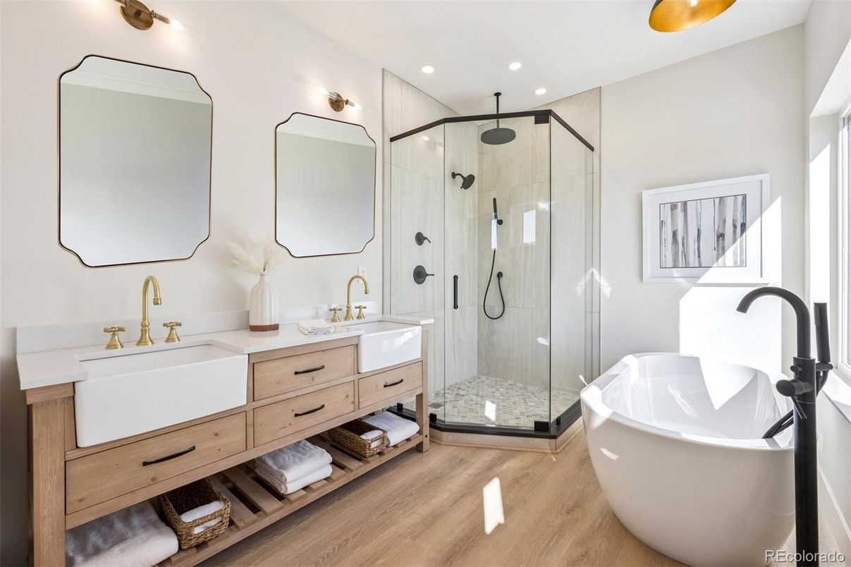 Bathroom, Dual Sink Vanities, Free Standing Baths, Glass Shower, Interior, Recessed Lighting, Wood Texture Flooring