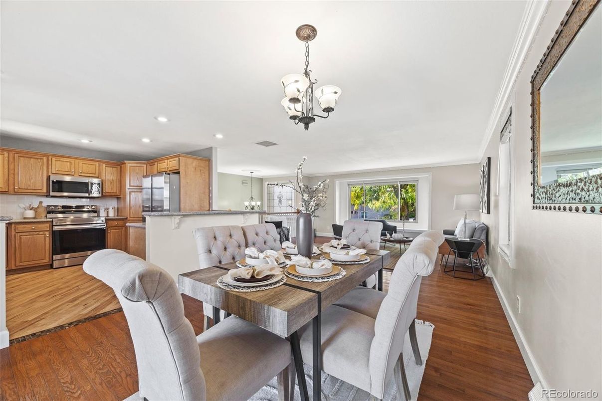 Chandelier, Dining room, Interior, Kitchen, Recessed Lighting, Stainless Steel Appliances, Wood Texture Flooring