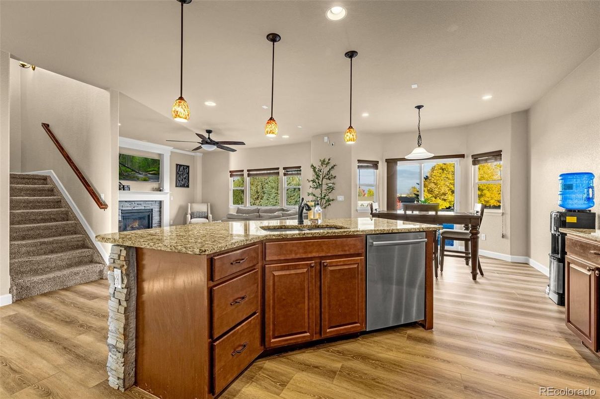 Dining room, Fireplace, Interior, Kitchen, Pendant Lights, Recessed Lighting, Wood Texture Flooring