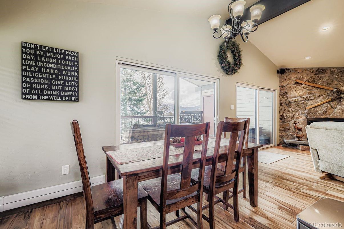 Chandelier, Dining room, Interior, Recessed Lighting, Stone Walls, Wood Texture Flooring