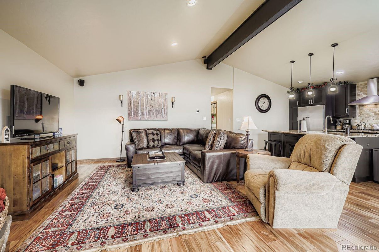 Interior, Kitchen, Living room, Pendant Lights, Recessed Lighting, Stainless Steel Appliances, Wooden Beams, Wood Texture Flooring