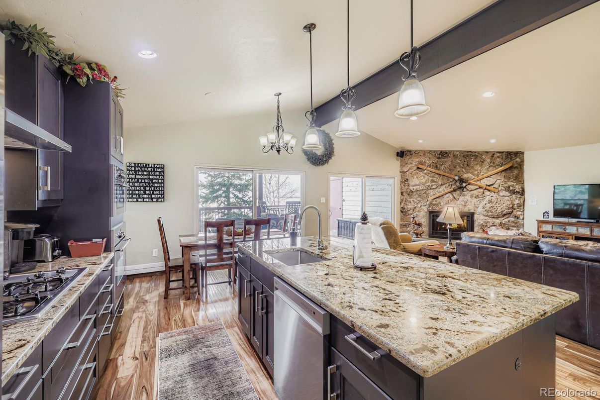 Chandelier, Dining room, Interior, Kitchen, Pendant Lights, Recessed Lighting, Stone Walls, Wood Texture Flooring