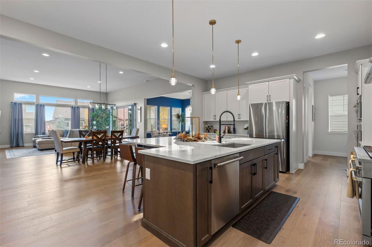 Dining room, Interior, Kitchen, Pendant Lights, Recessed Lighting, Stainless Steel Appliances, Wood Texture Flooring