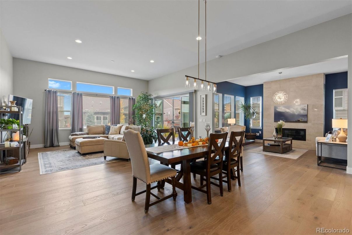 Dining room, Fireplace, Interior, Living room, Pendant Lights, Recessed Lighting, Wood Texture Flooring