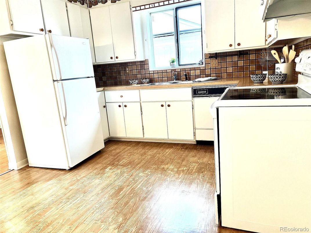 Interior, Kitchen, Tile Countertops, Wood Texture Flooring