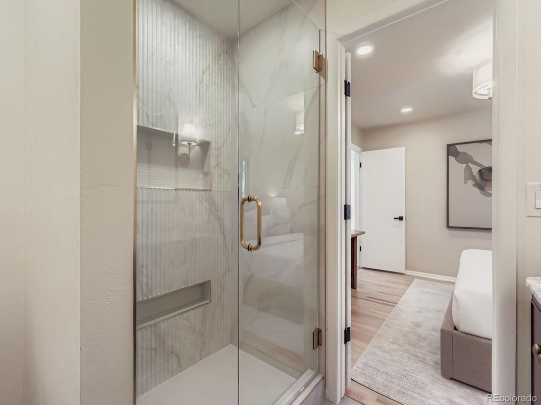 Bathroom, Glass Shower, Interior, Marble Walls, Recessed Lighting, Wood Texture Flooring