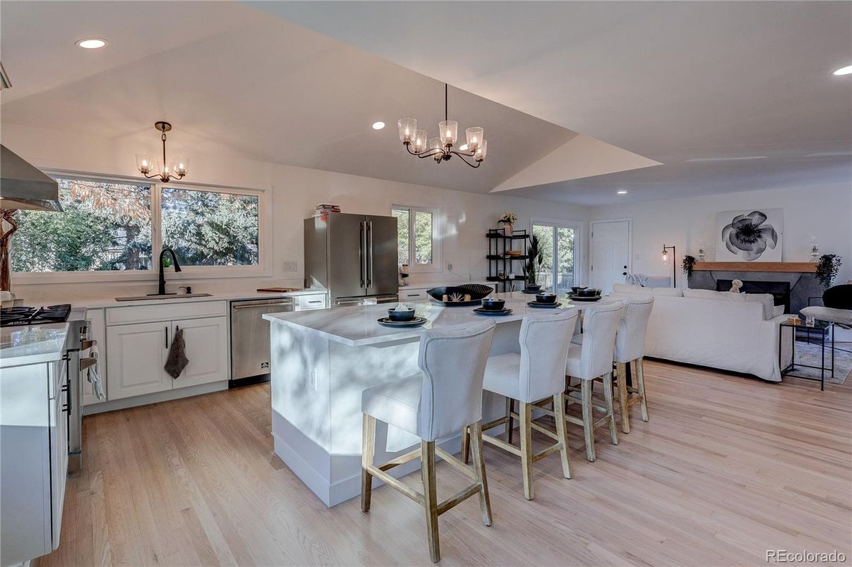 Chandelier, Interior, Kitchen, Living room, Pendant Lights, Recessed Lighting, Stainless Steel Appliances, Wood Texture Flooring