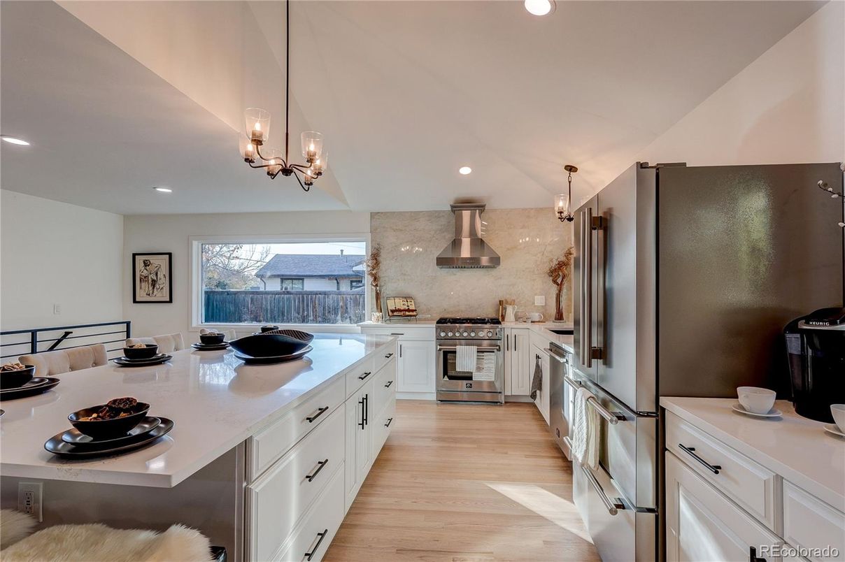 Chandelier, Interior, Kitchen, Pendant Lights, Recessed Lighting, Stainless Steel Appliances, Wood Texture Flooring