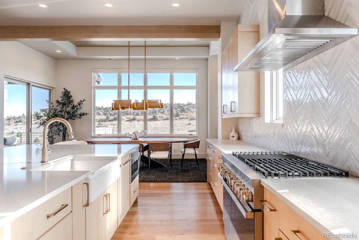 Dining room, Interior, Kitchen, Pendant Lights, Recessed Lighting, Stainless Steel Appliances, Wood Texture Flooring