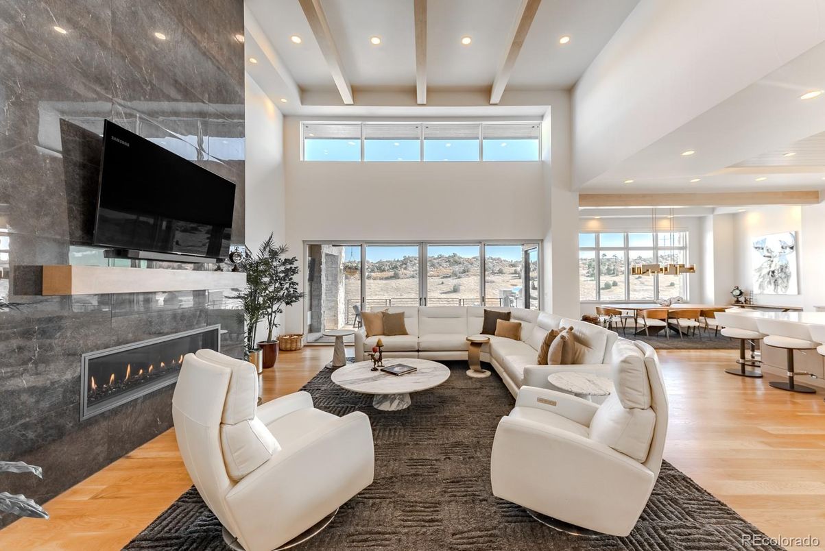 Dining room, Fireplace, Interior, Living room, Pendant Lights, Recessed Lighting, Wood Texture Flooring