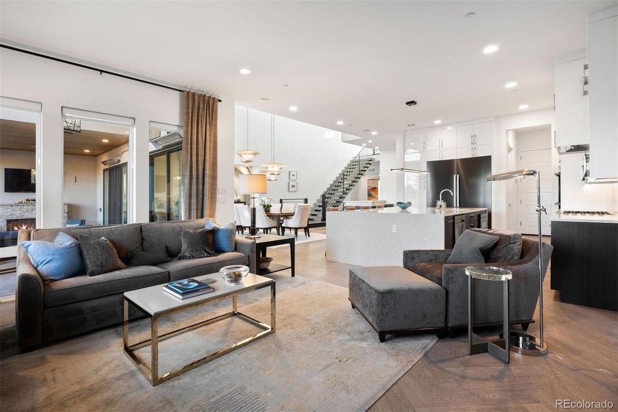 Dining room, Fireplace, Interior, Kitchen, Living room, Pendant Lights, Recessed Lighting, Stainless Steel Appliances, Wood Texture Flooring