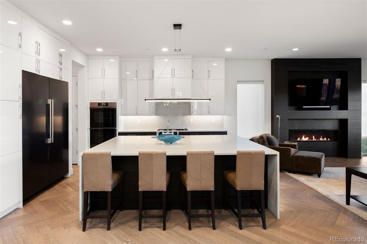 Fireplace, Interior, Kitchen, Living room, Pendant Lights, Recessed Lighting, Stainless Steel Appliances, Wood Texture Flooring