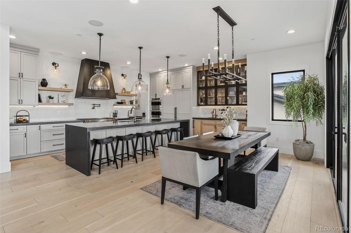 Dining room, Interior, Kitchen, Pendant Lights, Recessed Lighting, Stainless Steel Appliances, Wood Texture Flooring