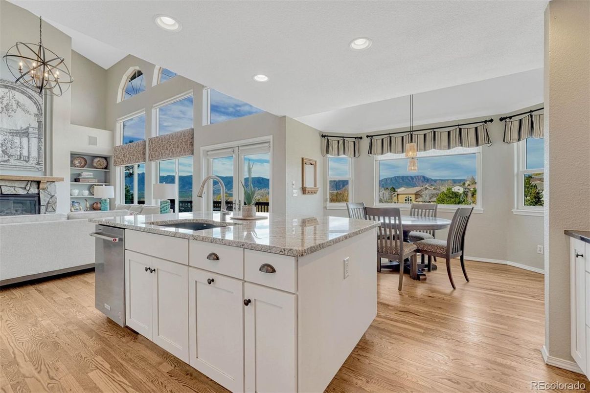Dining room, Fireplace, Interior, Kitchen, Pendant Lights, Recessed Lighting, Wood Texture Flooring
