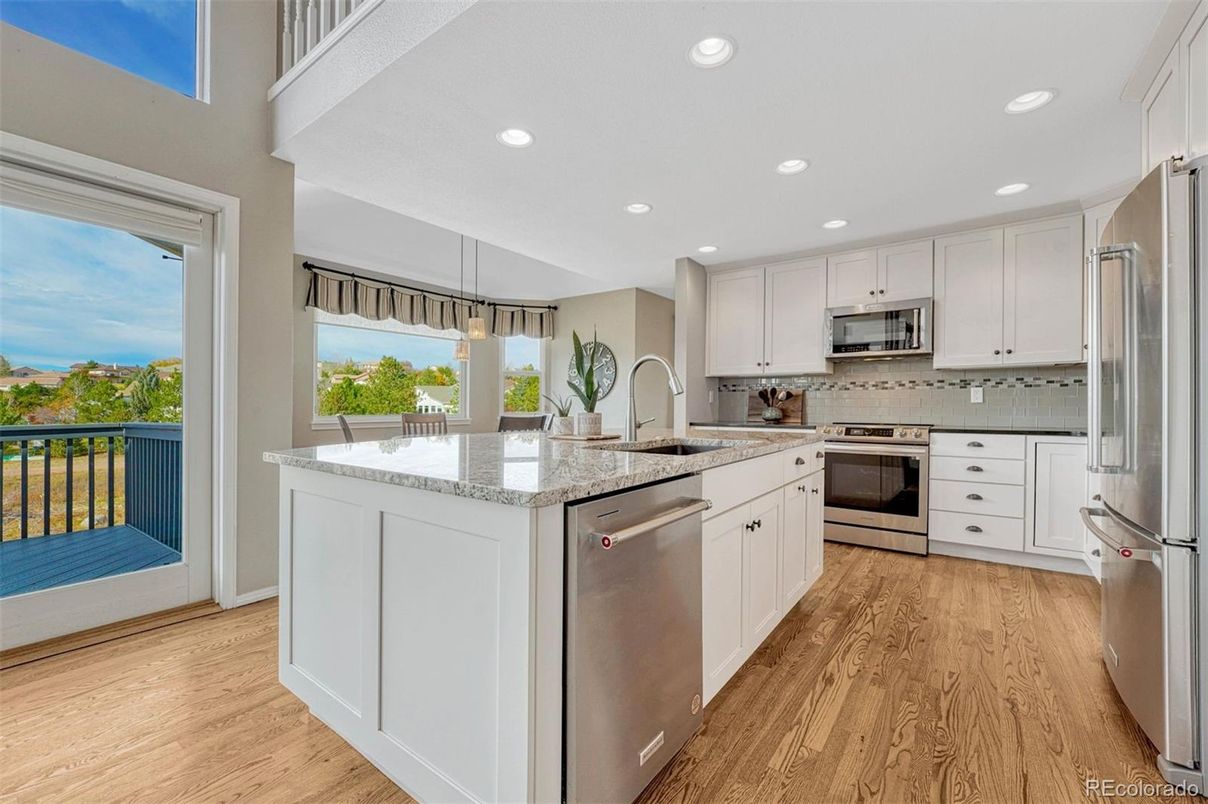 Interior, Kitchen, Pendant Lights, Recessed Lighting, Stainless Steel Appliances, Wood Texture Flooring