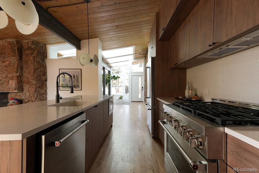 Interior, Kitchen, Pendant Lights, Stainless Steel Appliances, Stone Walls, Wooden Beams, Wooden Ceilings, Wood Texture Flooring