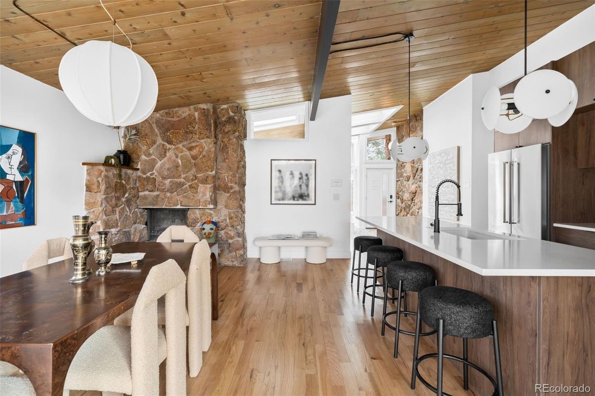 Dining room, Fireplace, Interior, Pendant Lights, Stone Walls, Wooden Ceilings, Wood Texture Flooring