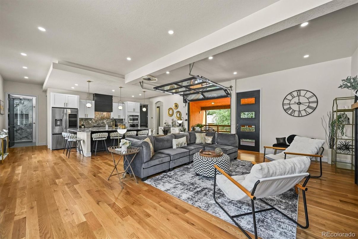 Dining room, Interior, Kitchen, Living room, Pendant Lights, Recessed Lighting, Stainless Steel Appliances, Wood Texture Flooring