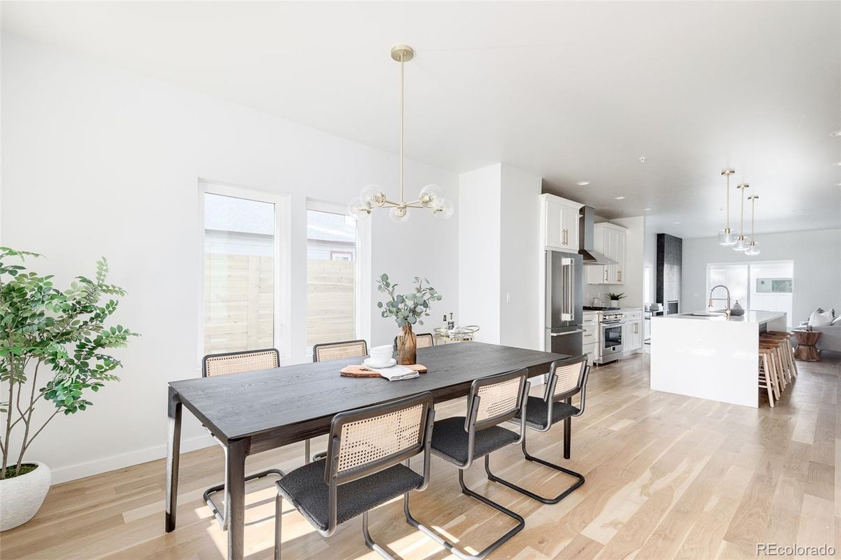 Dining room, Interior, Kitchen, Pendant Lights, Recessed Lighting, Stainless Steel Appliances, Wood Texture Flooring