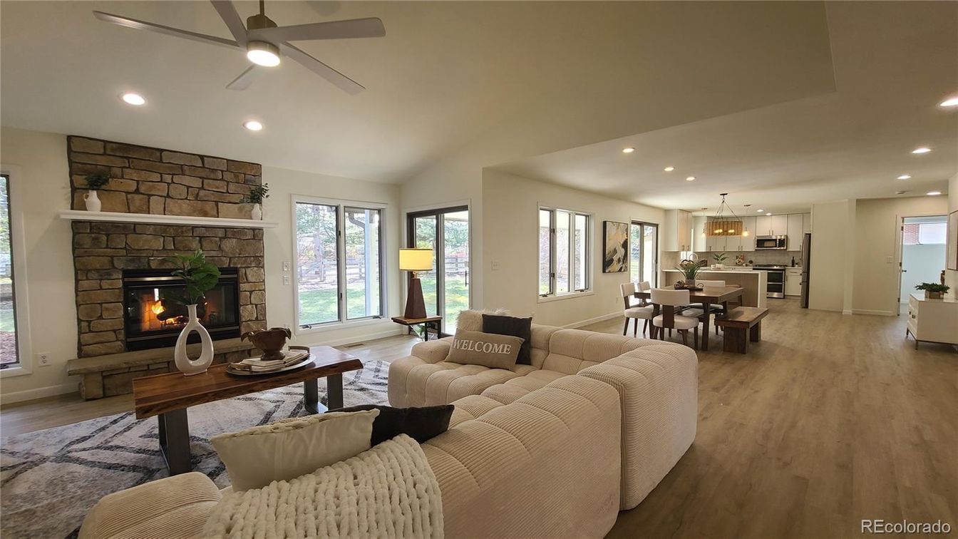 Dining room, Fireplace, Interior, Kitchen, Living room, Pendant Lights, Recessed Lighting, Stainless Steel Appliances, Stone Walls, Wood Texture Flooring