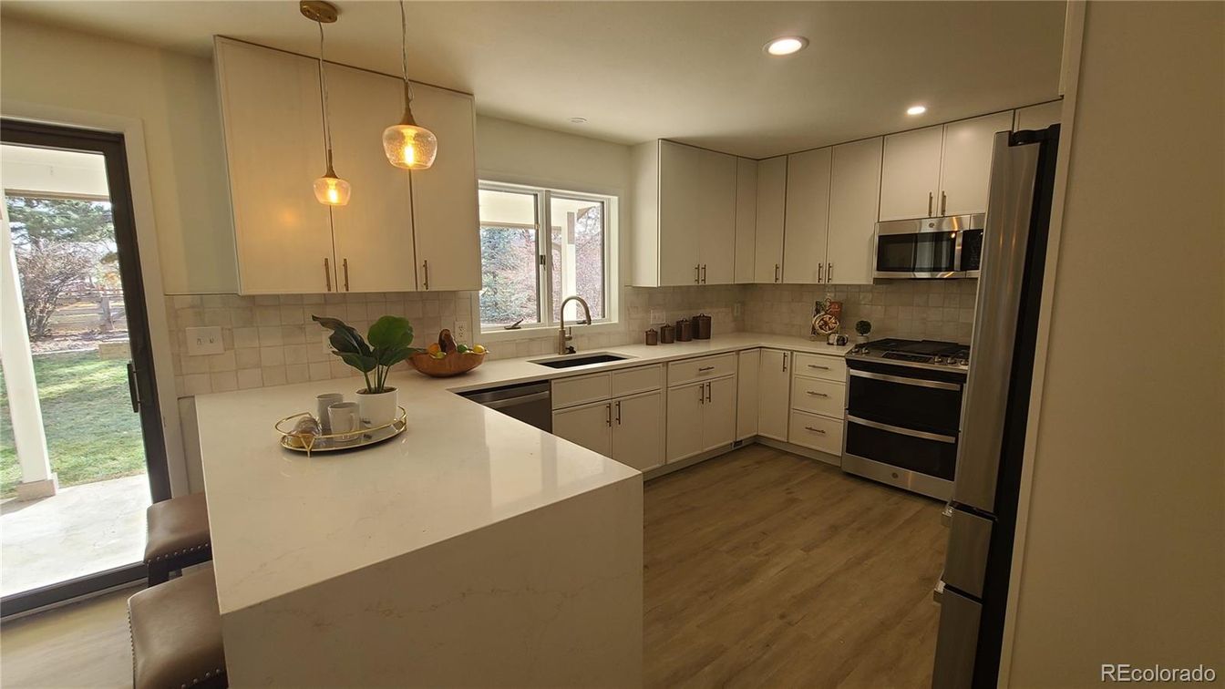 Interior, Kitchen, Pendant Lights, Recessed Lighting, Stainless Steel Appliances, Wood Texture Flooring