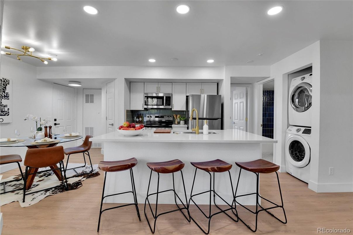 Dining room, Interior, Kitchen, Recessed Lighting, Stainless Steel Appliances, Washer, Wood Texture Flooring