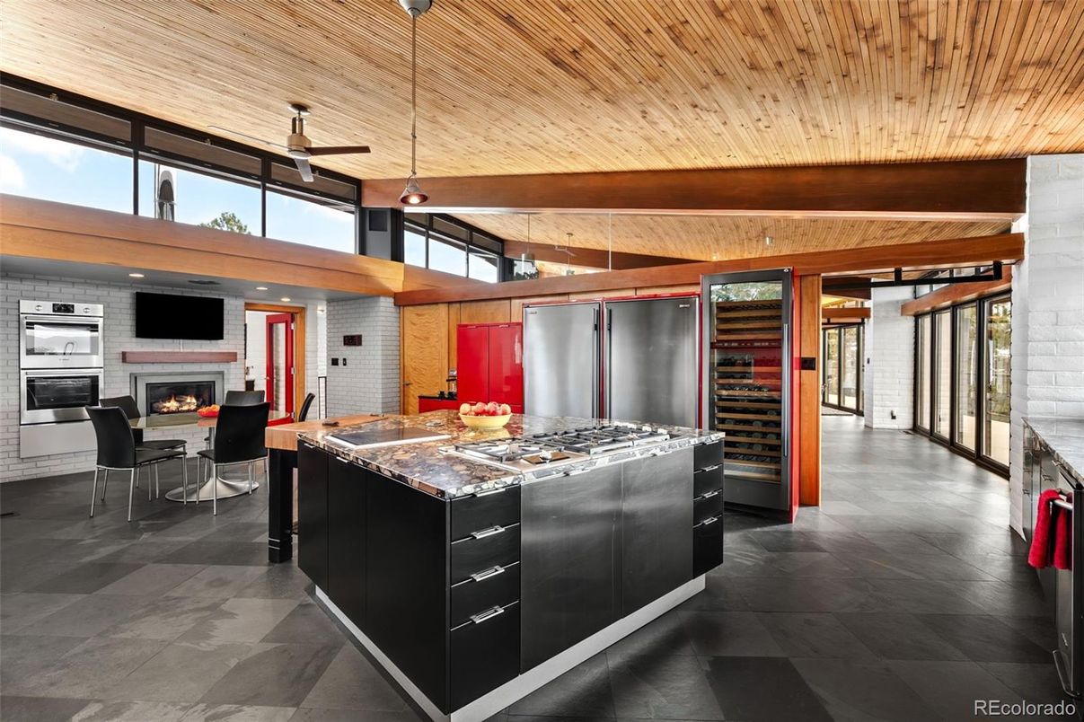 Dining room, Fireplace, Interior, Kitchen, Pendant Lights, Stainless Steel Appliances, Stone Walls, Wooden Beams, Wooden Ceilings