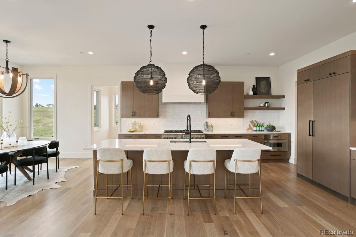 Dining room, Interior, Kitchen, Pendant Lights, Recessed Lighting, Stainless Steel Appliances, Wood Texture Flooring