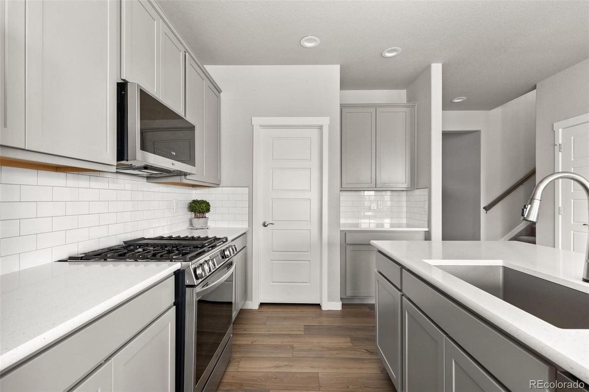 Interior, Kitchen, Recessed Lighting, Stainless Steel Appliances, Wood Texture Flooring