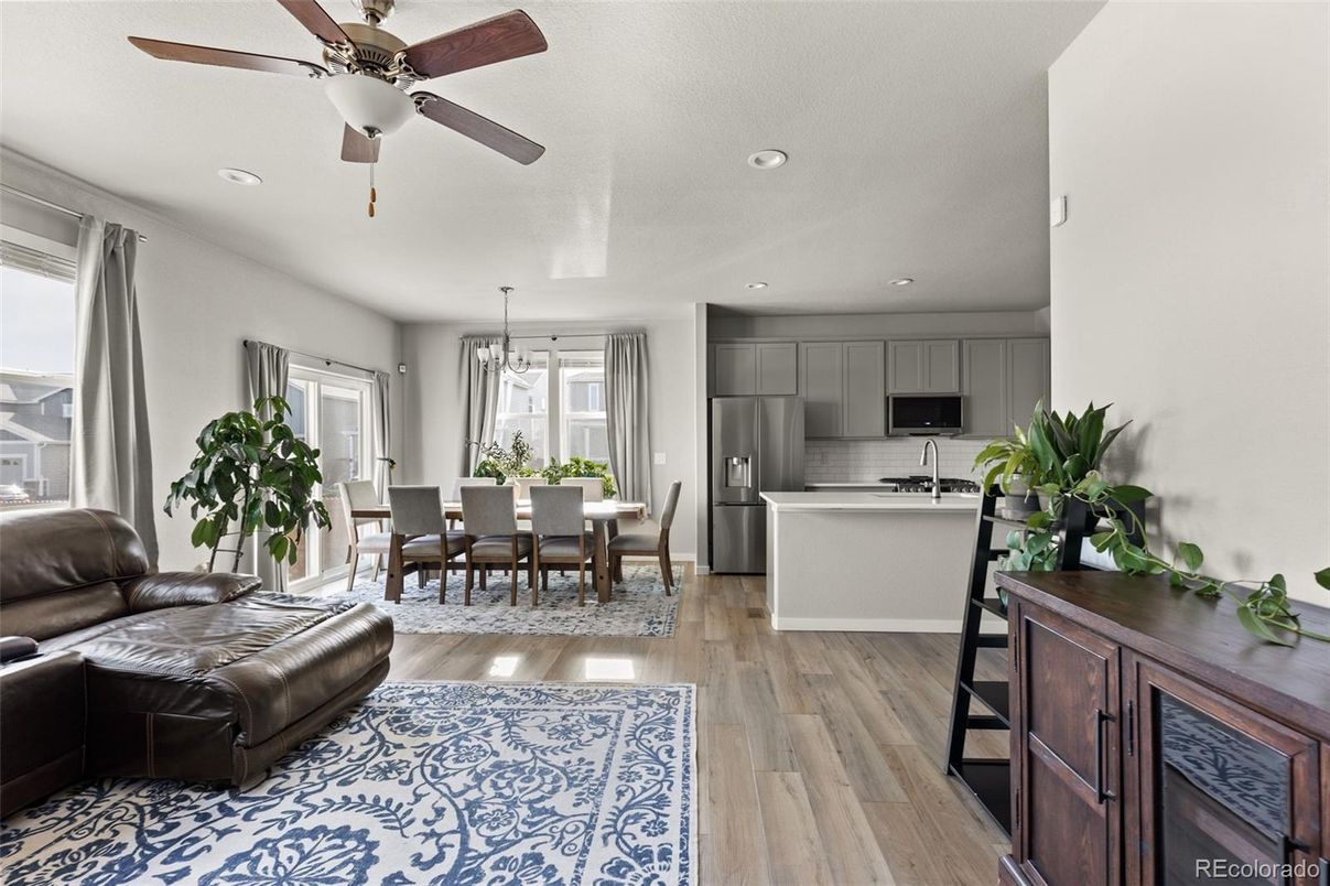 Dining room, Interior, Kitchen, Pendant Lights, Recessed Lighting, Stainless Steel Appliances, Wood Texture Flooring
