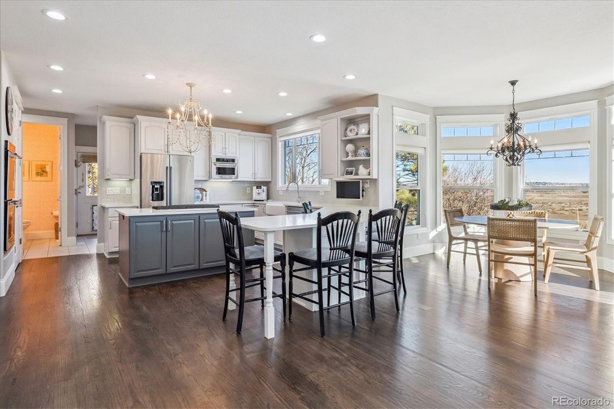 Chandelier, Dining room, Interior, Kitchen, Recessed Lighting, Stainless Steel Appliances, Wood Texture Flooring
