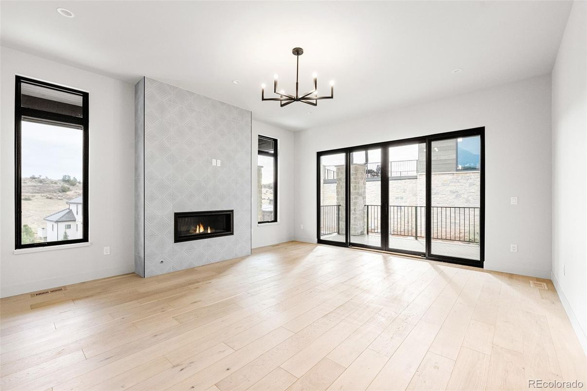 Empty room, Fireplace, Interior, Pendant Lights, Recessed Lighting, Wood Texture Flooring