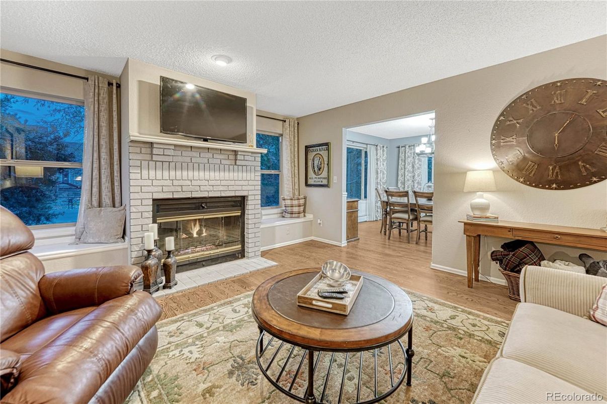 Dining room, Fireplace, Interior, Living room, Recessed Lighting, Wood Texture Flooring