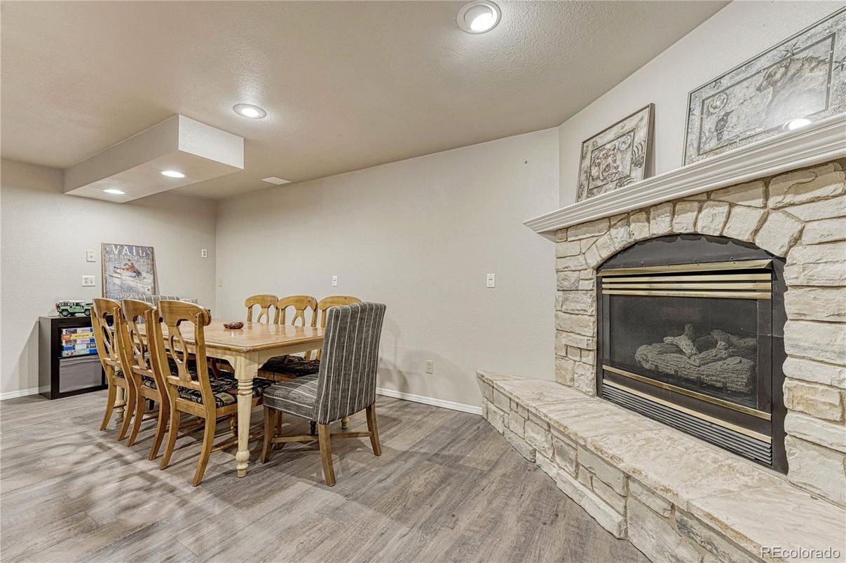 Dining room, Fireplace, Interior, Recessed Lighting, Wood Texture Flooring