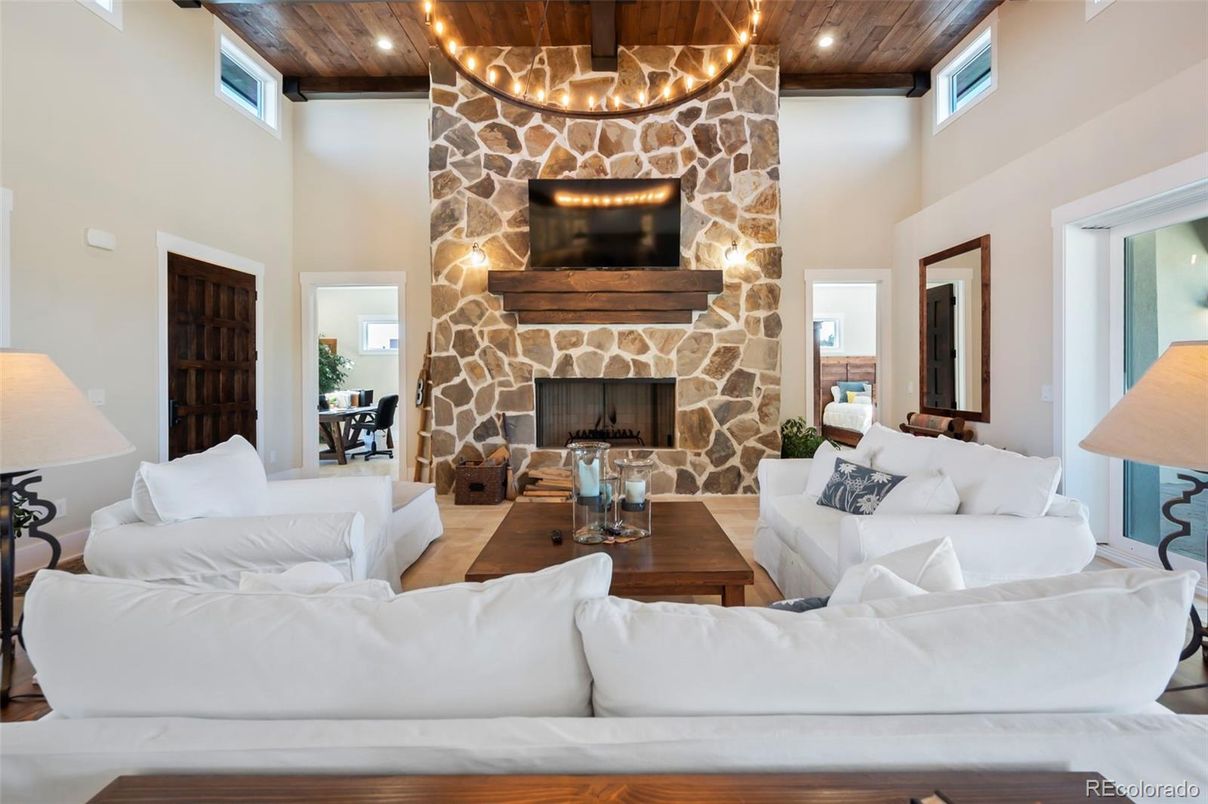 Fireplace, Interior, Living room, Recessed Lighting, Stone Walls, Wooden Ceilings