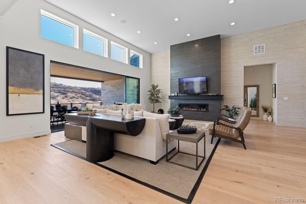 Dining room, Fireplace, Interior, Living room, Recessed Lighting, Wood Texture Flooring