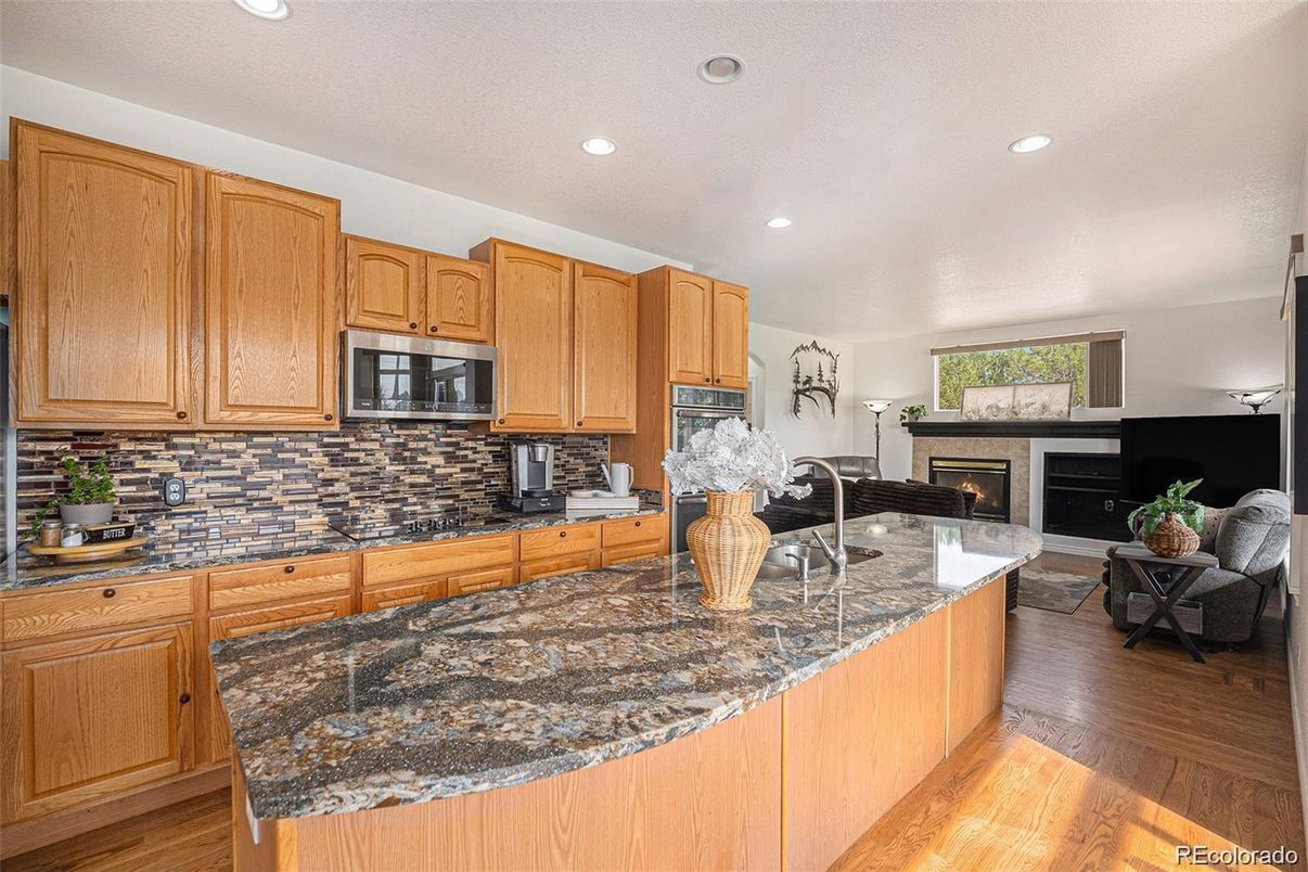 Fireplace, Interior, Kitchen, Recessed Lighting, Wood Texture Flooring