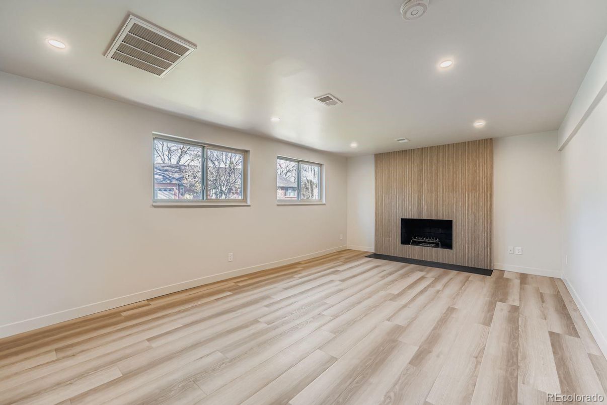 Empty room, Fireplace, Interior, Recessed Lighting, Wood Texture Flooring