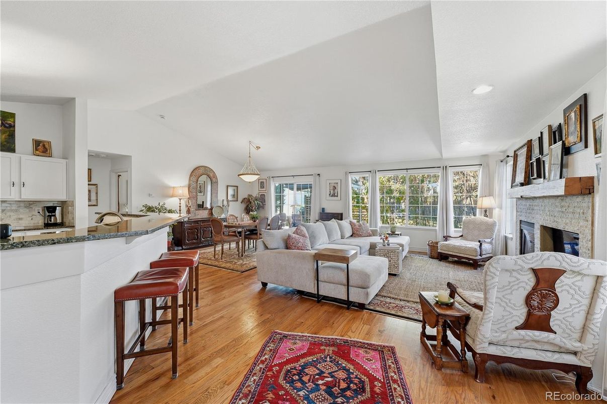 Dining room, Fireplace, Interior, Living room, Pendant Lights, Recessed Lighting, Wood Texture Flooring